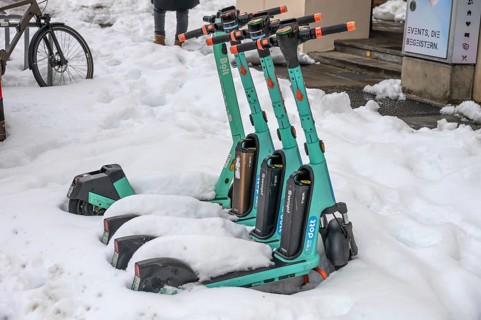 Parked, snow-covered scooters, Nuremberg, Middle Franconia, Bavaria, Germany
