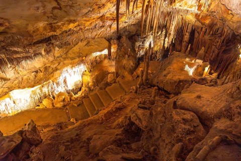 Geological formations of stalactites and stalagmites create a breathtaking spectacle in the caves