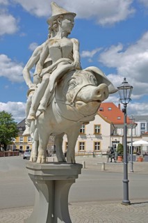 Sculpture Lucky Pig by Peter Lenk 2016, monument to Elector Carl Theodor, Bavarian, Palatine, Duke,