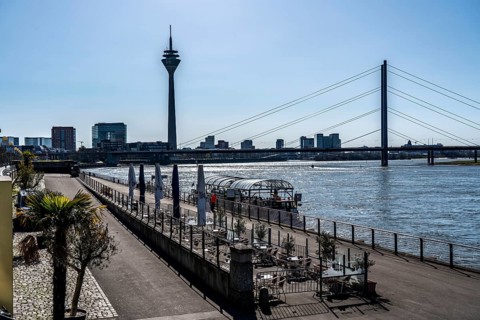 Empty Rhine embankment promenade, consequences of the contact ban, effects of the coronavirus