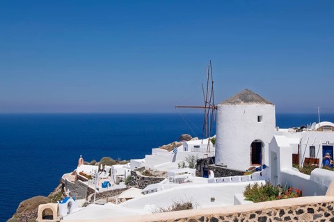 View over the town of Oia on the crater rim, Santorini, Cyclades, Greek island, Greece