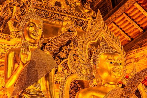 Gilded Buddha statues, Buddhist temple complex Wat Phra That Si Chom Thong, near Chiang Mai, Chiang