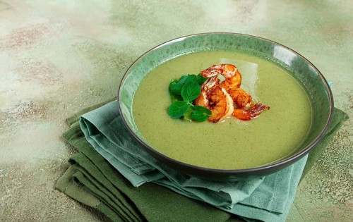 Pea cream soup, with shrimp, green soup, homemade, top view, no people
