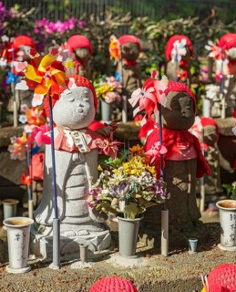 Jizo statues at the Garden of Unborn Children, Zoj-ji temple, Tokyo, Japan