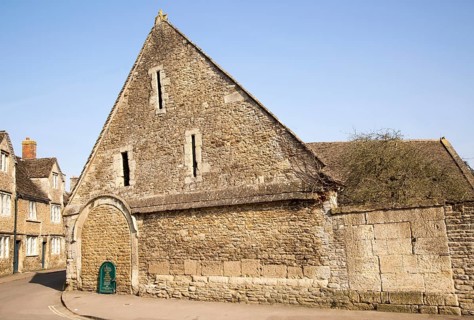 Historic tithe barn in the village of Lacock, Wiltshire, England, UK
