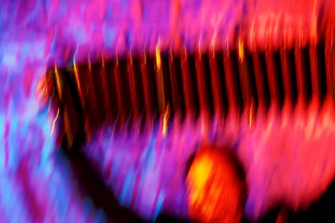 Bandoneon, bandonion, accordion player on a stage, milonga, concert, tango dance event, symbolic