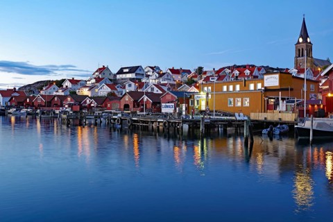 Harbour and small wooden houses in autumn evening light, blue hour, silence, tranquillity,