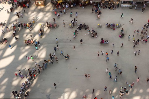 People, top view of a crowd, tourists queuing and walking, standing on square under Eiffel Tower,