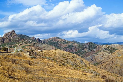 Olive groves and mountains around Ghost Town, Pentedattilo Village, Calabria, Italy