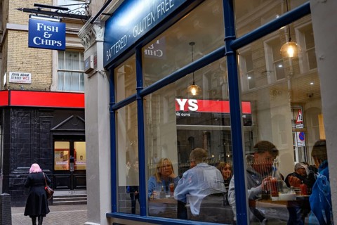 A traditional British fish and chip shop restaurant on the south bank of the River Thames, London