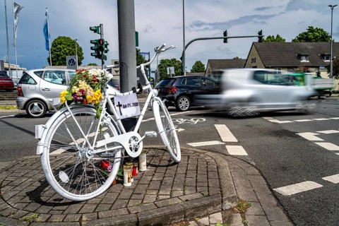A ghost bike at the scene of an accident where a cyclist was run over by a lorry two days earlier