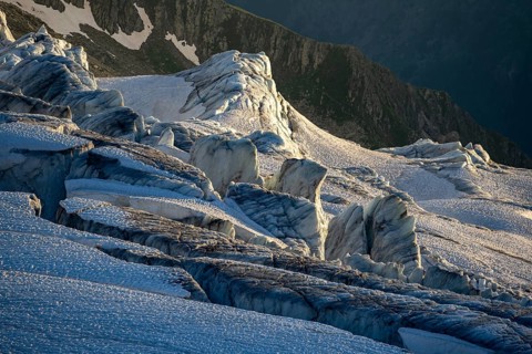 Glacier ice with crevasses in the evening light, Glacier du Tour at sunset, High alpine mountain