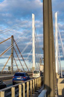 Traffic on the A40 Neuenkamp bridge, piers and stay cables of the new motorway bridge over the