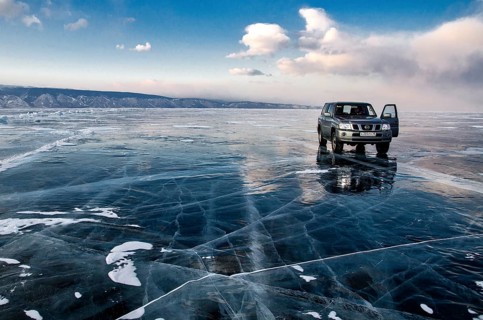 Car on the ice, Lake Baikal, Olkhon Island, Pribaikalsky National Park, Irkutsk Province, Siberia,