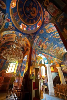 Colourful frescoes of Christ on the ceiling and walls of a 200-year-old church in Lagia, Mani,