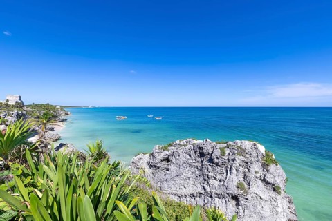 Mexico, Tulum Archaeological Zone and Mayan pyramids on scenic ocean shore