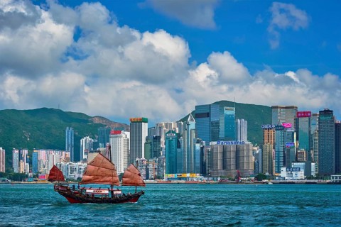 HONG KONG, CHINA, MAY 1, 2018: Hong Kong skyline cityscape downtown skyscrapers over Victoria