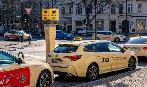 Taxi stop with yellow call post at Schlüterstraße and Kurfüstendamm intersection, Berlin, Germany