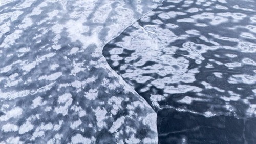 Frozen lake in early winter. Region of La Mauricie. Province of Quebec. Canada
