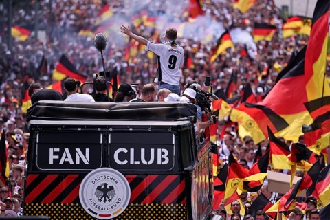 Fan bus, logo, fan march, German football fans march to the quarter-final Spain versus Germany,