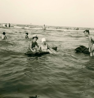 Historical photo summer 1961, tourists, beach, Rimini, Italy