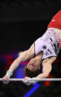 Alexander Kurz GER high bar action gymnastics, EnBW DTB-Pokal, Porsche-Arena, Stuttgart,