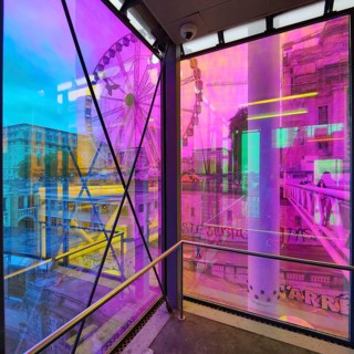 Marollescenece, art installation The Cube, coating of the windows with translucent dichroic films,