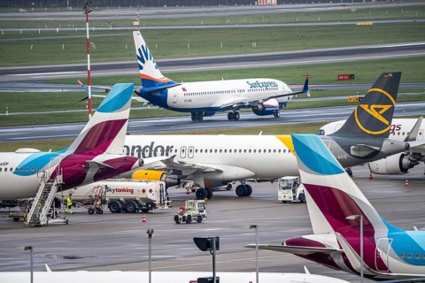 Düsseldorf Airport, Eurowings aircraft on the apron, Sunexpress Boeing 737 on the taxiway for
