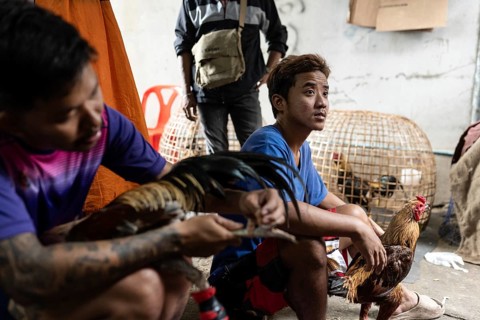 Bangkok, Thailand. February 25th 2025. Local Thai men from the Khlong Toei neighborhood in Bangkok