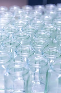 General view of many empty transparent jars in orderly arrangement, jam production, Haselstaller