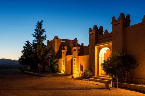 Kasbah style hotel, blue hour, Boumalne Dades, Dades Valley, Atlas Mountains, Morocco