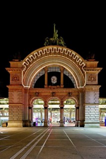 Archway on the station square, light installation at dusk, Lilu, Light Festival 2023, Lucerne,