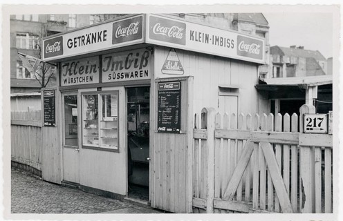 Berlin, post-war period, small snack stand with Coca-Cola advertisement, sale of sausages and