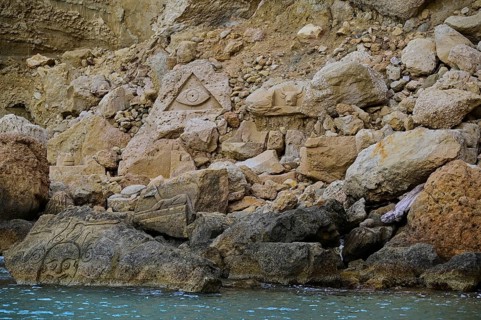 Red Beach, dream beach in the neighboring bay of Matala, complex rock carvings and sculptures in a