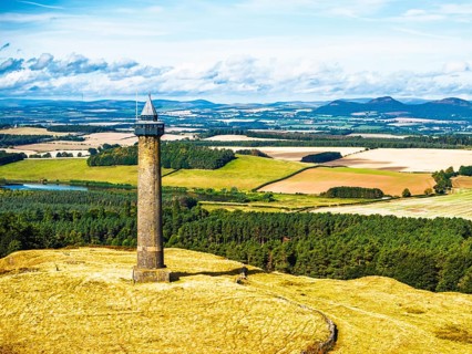 Waterloo Monument over Scottish fields and farms from a drone, Jedburgh, Scotland, UK