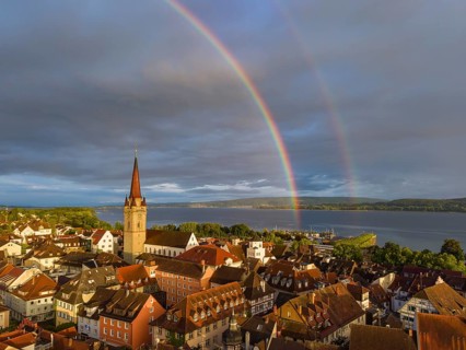 Aerial view of the historic old town of Radolfzell am Lake Constance with the cathedral illuminated