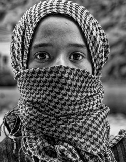 Portrait of a young Moroccan woman, veiled, headscarf, Palestinian, Berber, b/w photo, black and