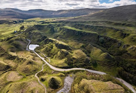 Aerial drone photo of the volcanic landscape of Glen Fairy, Isle of Skye, Scotland, UK