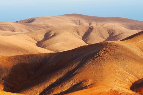 View of the barren and eroded landscape from the Mirador Morro Velosa viewpoint, Fuerteventura,