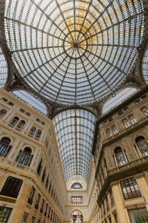 Galleria Umberto I, interior view with glass roofs and dome, historic shopping arcade, Naples,