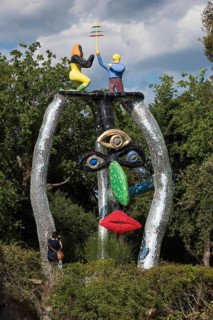 Face, colorful sculpture, Giardino dei Tarocchi or Garden of Tarot, by Niki de Saint Phalle and