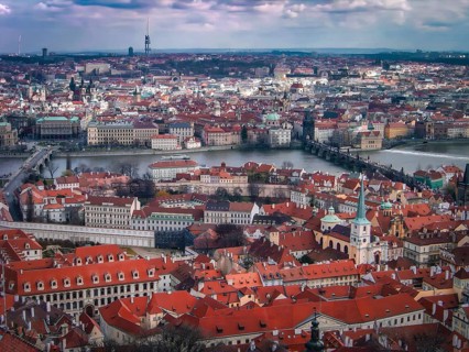 View from above of the old town of Prague, Vltava and Charles Bridge, panorama of a city with