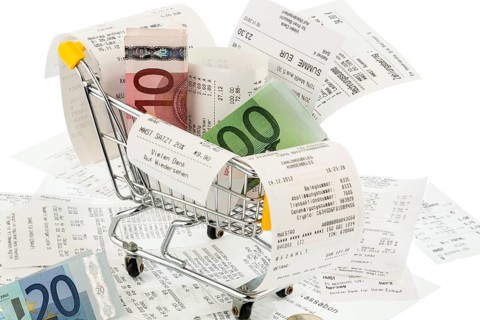 Shopping carts, banknotes and receipts, symbolic photo of purchasing power, consumption and