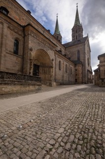 20 August 2026, View of the historic Bamberg Cathedral with its stone facade and spires along a