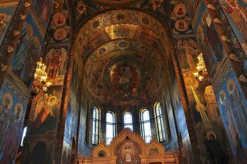Interior of a church with ornate frescoes and icons on the ceiling and walls, Church of the