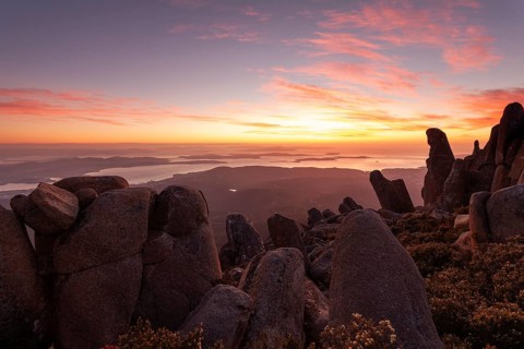 Glowing red sunrise over Mt. Wellington near Hobart