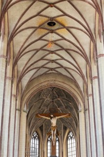 Rose petal rain from the Heiliggeistloch in the Abbey Basilica of St. Martin, Dove, Pentecost,