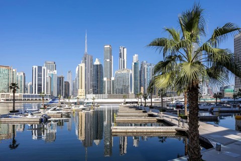 Downtown Dubai skyscrapers with Burj Khalifa skyline on the Marasi Bay Business Bay Canal in Dubai,