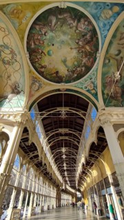 Artistically decorated ceiling with fresco and elegant arched structures, Maxim Gorky Collonade,