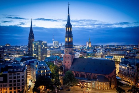View of St. Katharinen Main Church, St. Nikolai, City Hall and Michel over Hamburg city center at